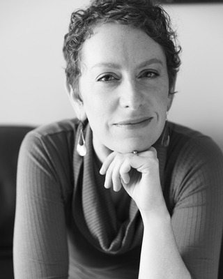 Black-and-white portrait of Susan Levin